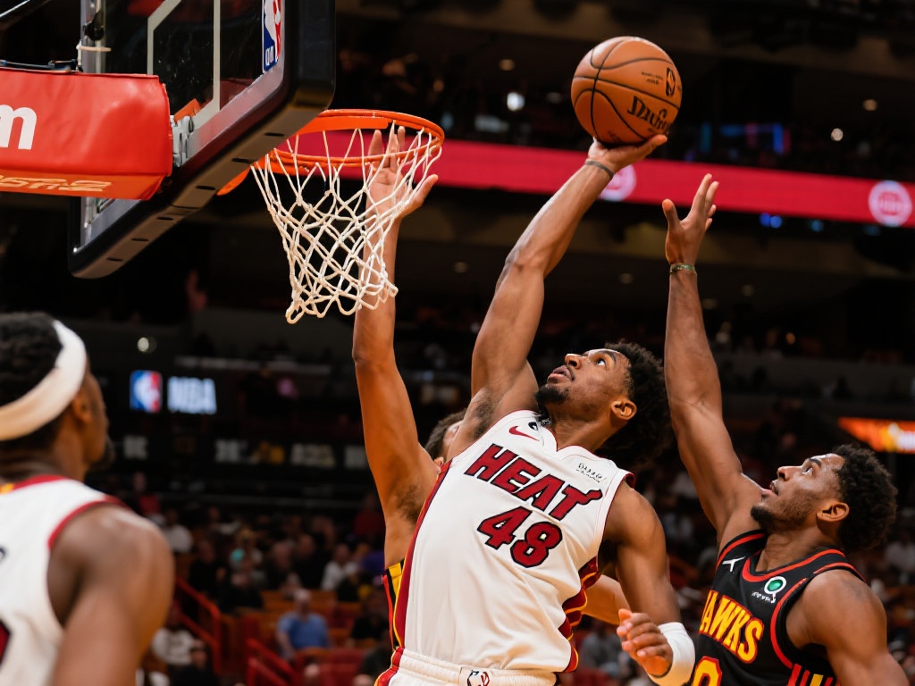 希罗36分特雷-杨29+12 热火力克老鹰豪取三连胜 值得一提的是,热火队在篮板球的争夺上也占